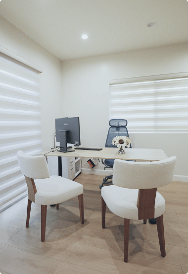 Professional office space with a desk and comfortable chair, creating a welcoming work environment